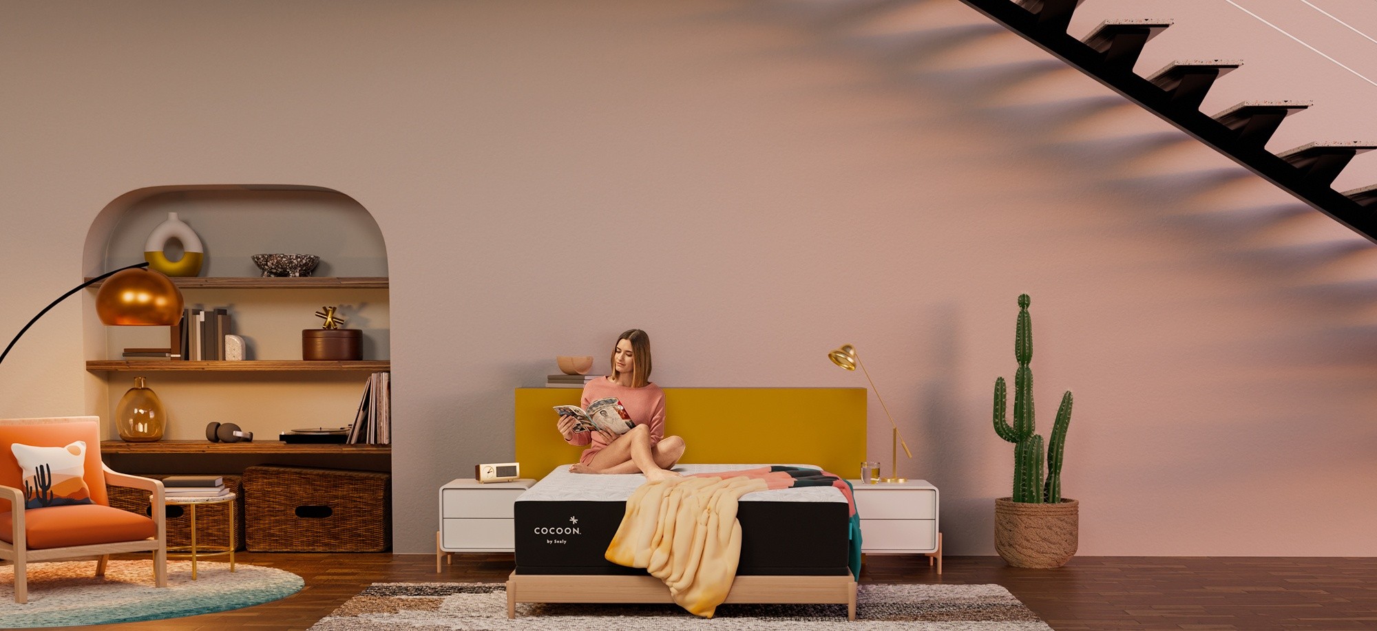Woman sitting on Cocoon mattress in styled room - homepage hero